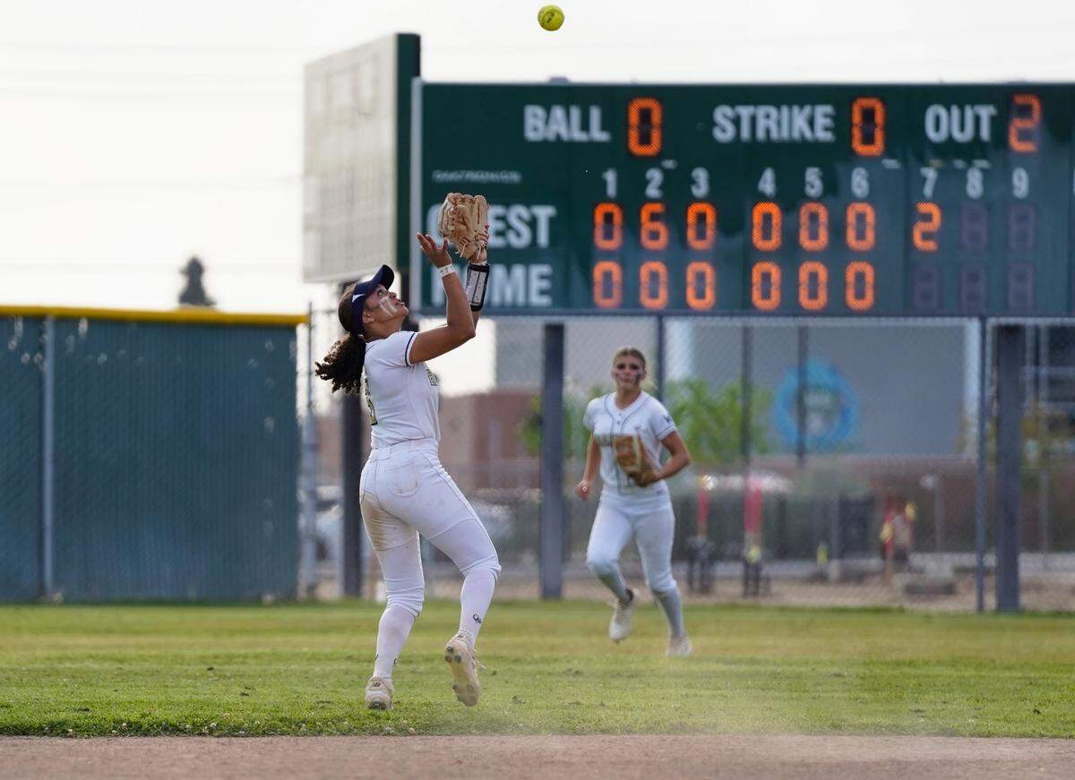 Central Catholic’s Jazmarie Roberts records the final out during a Valley Oak League game against Manteca at Manteca High School on Tuesday, April 22, 2025.