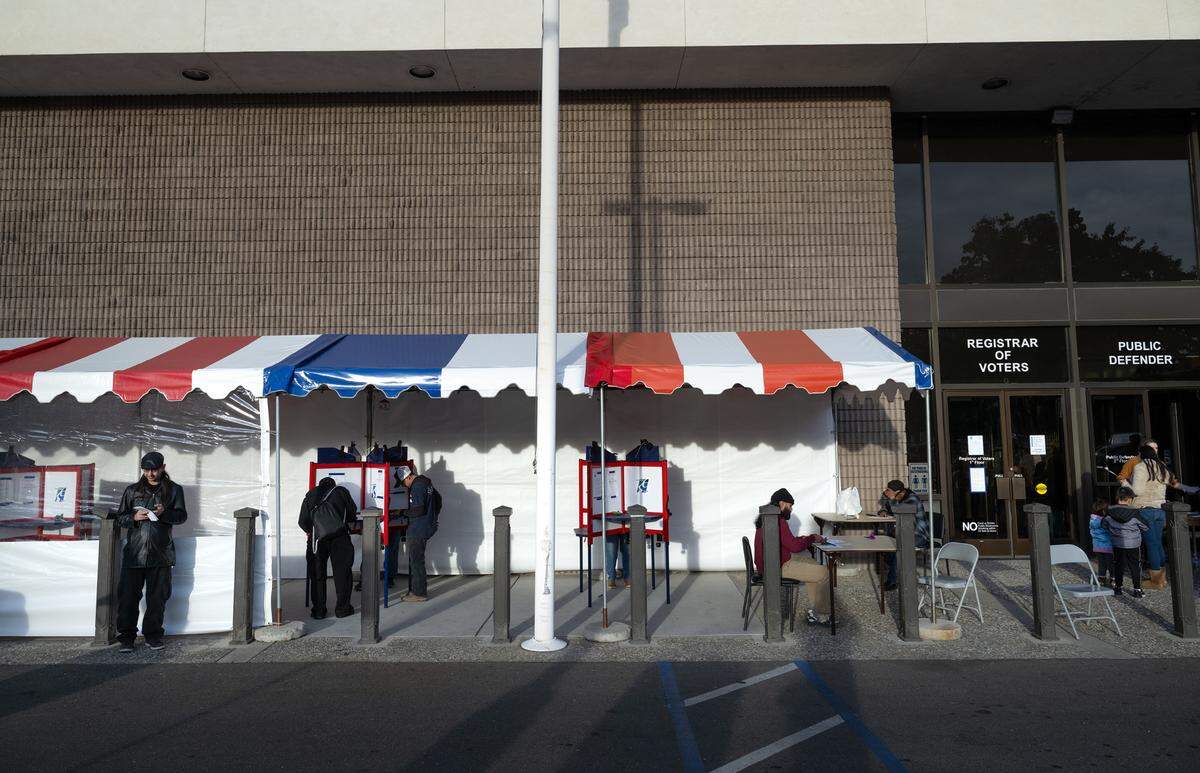 People vote at the Stanislaus County Registrar of Voters office in Modesto, Tuesday, Nov. 5, 2024.
