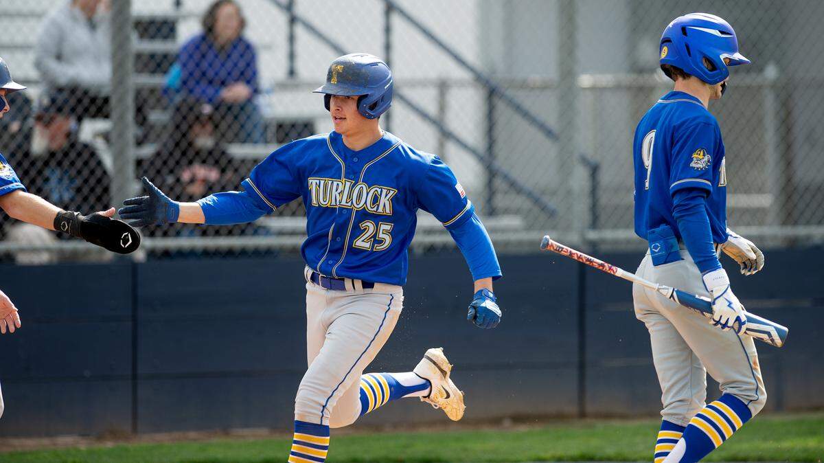 Turlock’s Carson Gonzales scores during the Central California Athletic league game with Downey at Downey High School in Modesto, Calif., Thursday, March 23, 2023. Turlock won the game 5-2.