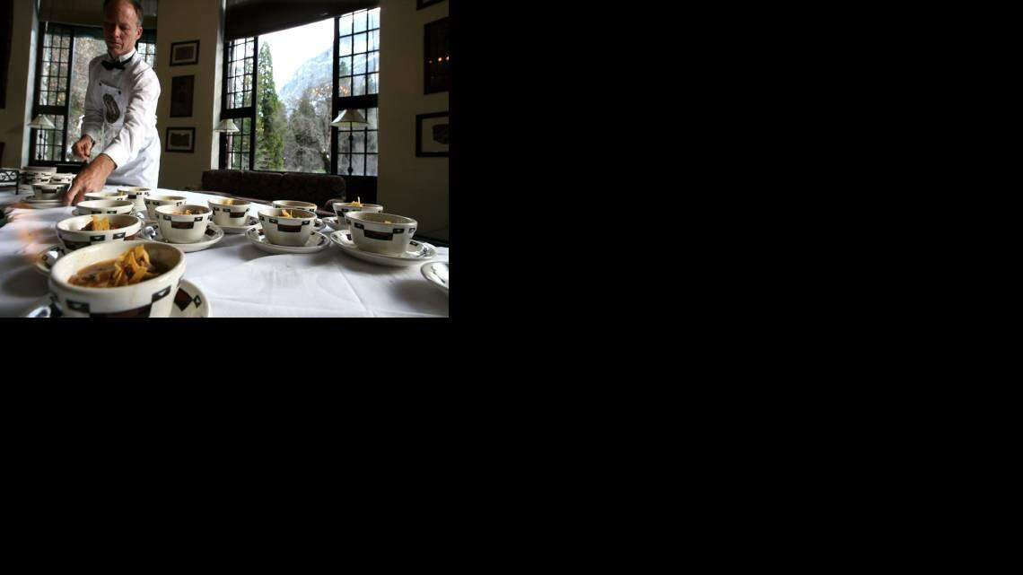 Marty Braselton, server at the historic Ahwahnee Hotel, arranges cups of albondigas soup for tasting after a cooking demonstration by Traci des Jardins during the annual Chefs' Holidays at The Ahwahnee. She was the featured chef for the annual event. (John Walker/ jwalker@fresnobee.com)