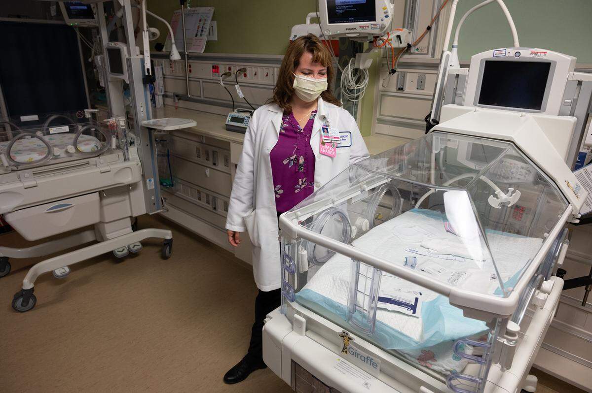 Nursing Director Lorena Acevedo stands by an isolette in the neonatal intensive care unit at Kaiser Modesto Medical Center in Modesto, Calif., on Monday, May 17, 2021.