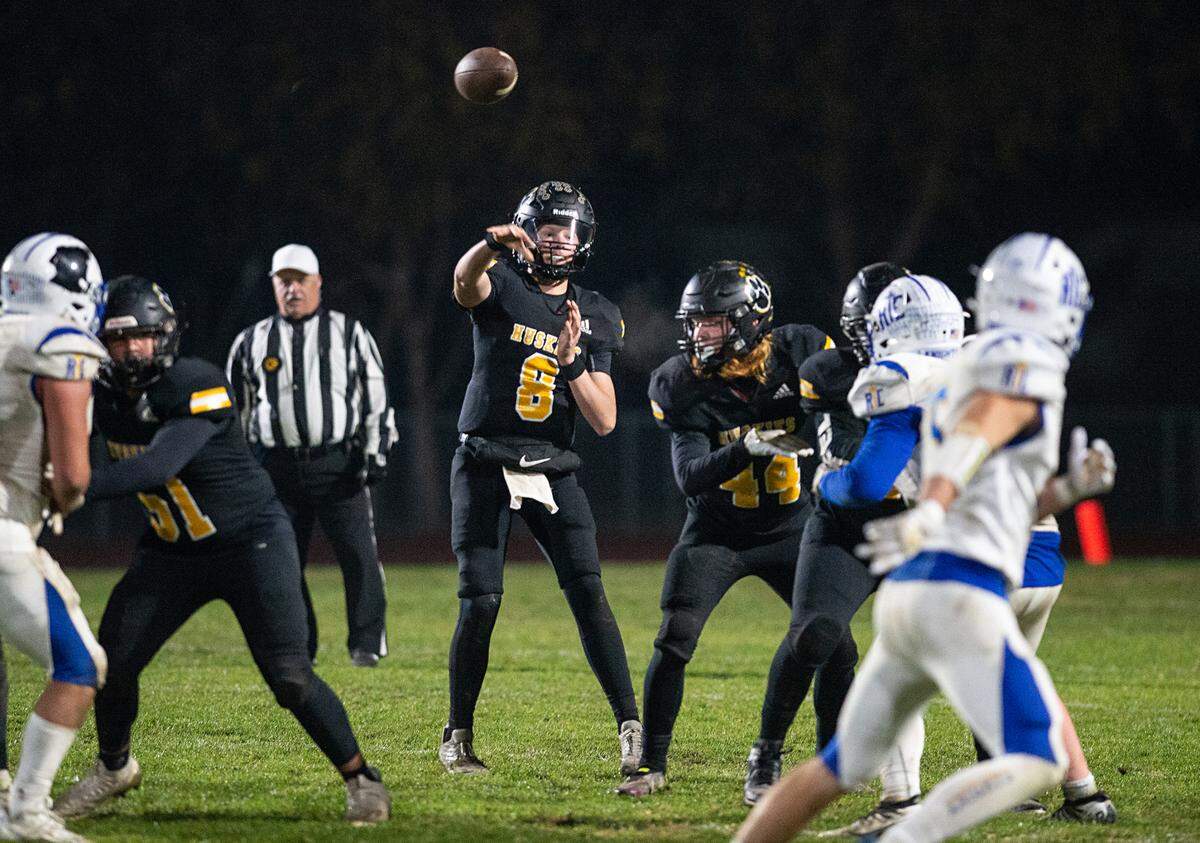 Hughson’s Robert McDaniel makes a pass during the CIF Division 5-AA Northern California Regional Bowl Game with Ripon Christian on Friday, Dec. 2, 2022, in Hughson, Calif.