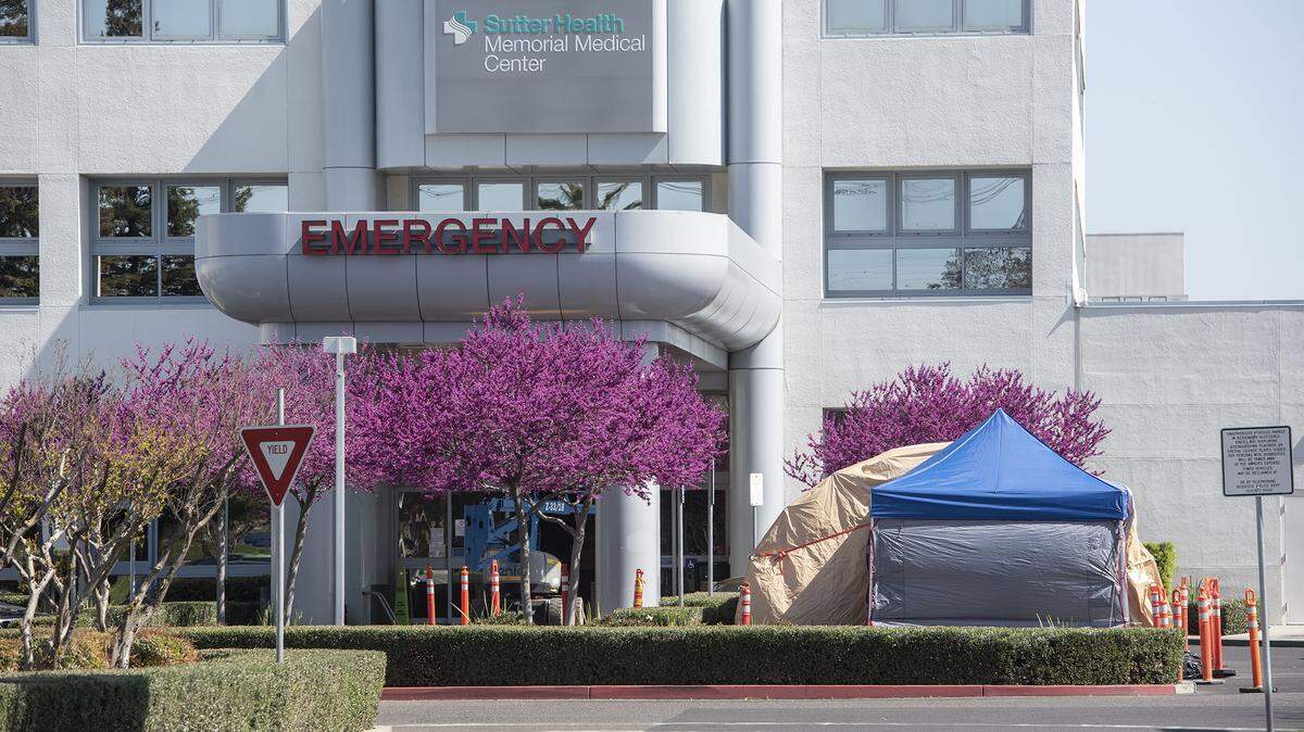 Sutter Memorial Medical Center has set up a tent outside the emergency department in Modesto, Calif., on Friday, March. 13, 2020.