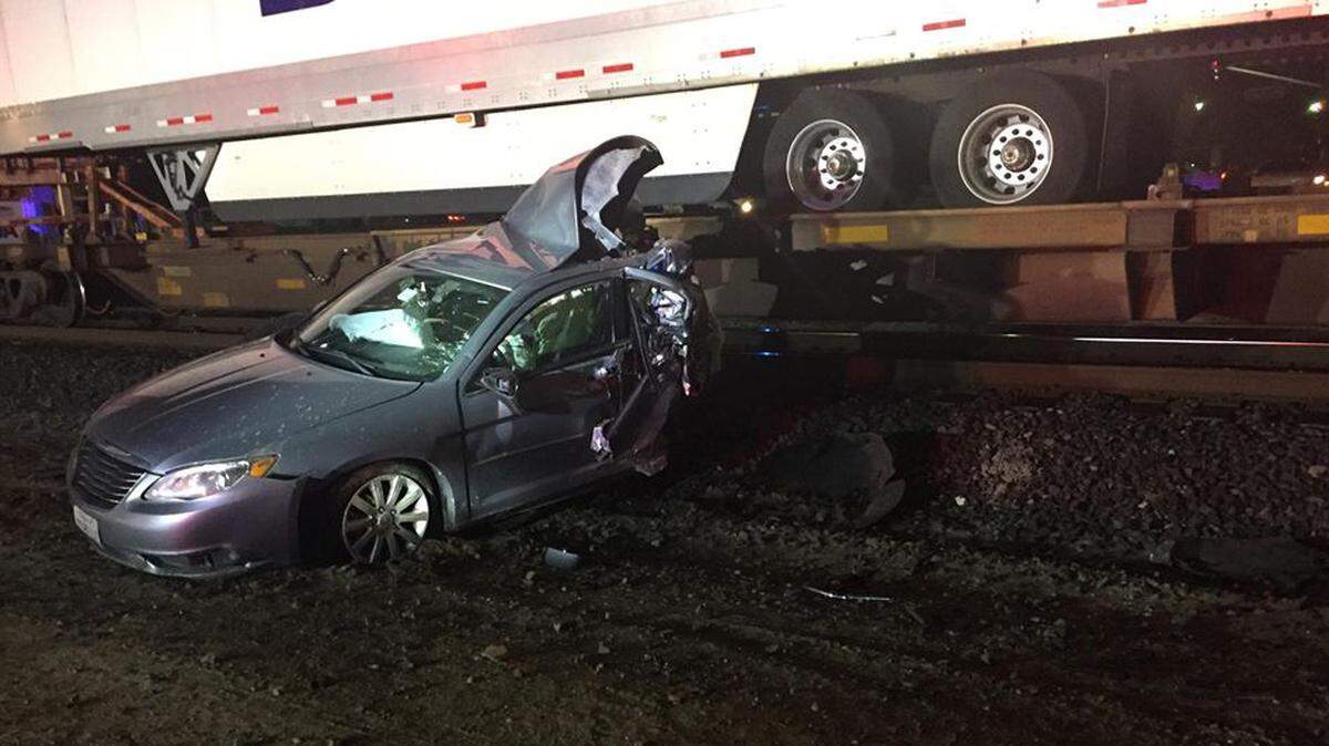 This image posted by the Turlock Fire Department shows a car hit by a train Saturday, Jan. 27, at Monte Vista Avenue and Golden State Boulevard in Turlock.