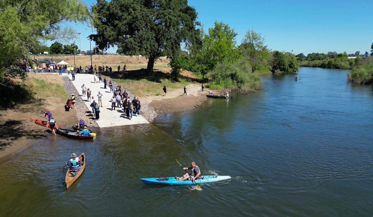 Paddlers, including Chris Guptill, arrive in kayaks at the Neece Drive Boat Launch at Tuolumne River Regional Park in Modesto on May 10, 2024.
