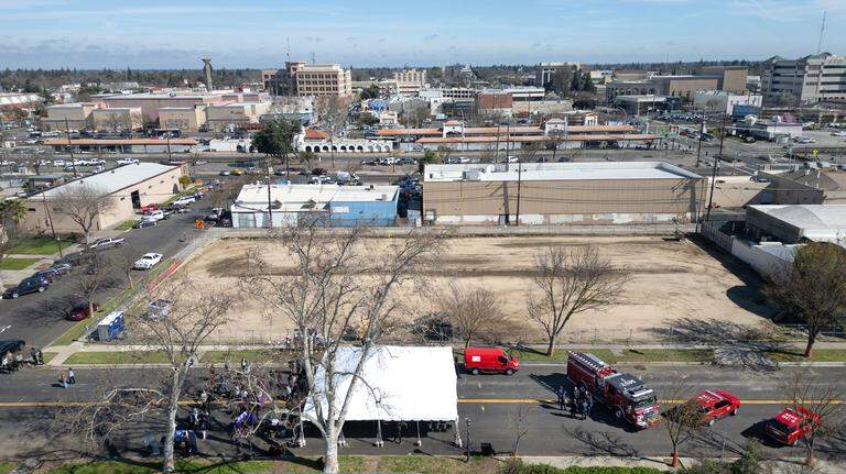 Four stories of low-cost apartments begin rising near depot where Modesto was born