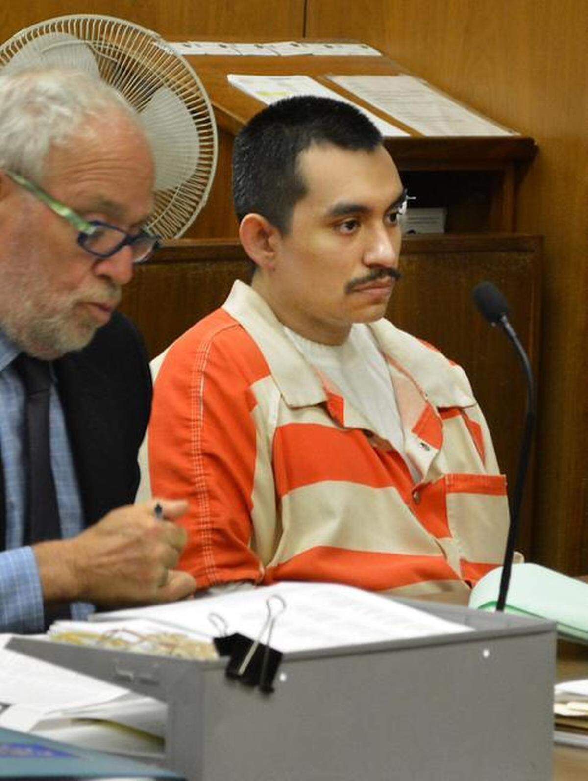 Ernesto Morales sits with defense attorney Robert Orenstein during his sentencing hearing Thursday, August 14, 2014