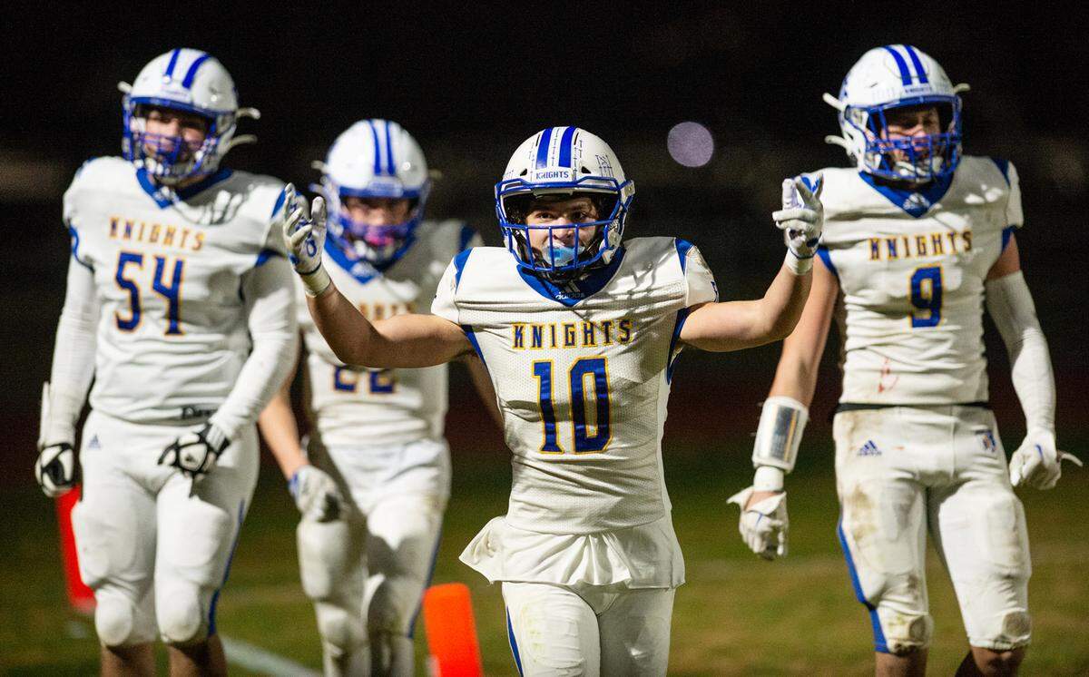Ripon Christian’s Brady Grondz motions to the sideline after a touchdown during the CIF Division 5-AA Northern California Regional Bowl Game with Hughson on Friday, Dec. 2, 2022, in Hughson, Calif.