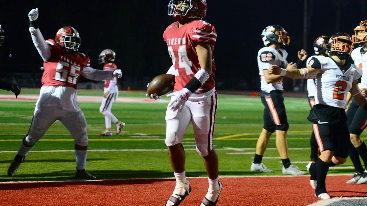 Patterson running back Lolo Mataele (24) skips into the end zone to score a touchdown during a CIF Division III Sac-Joaquin Section Football Playoff game between Patterson High School and Roseville High School at Patterson High School in Patterson CA on November 11, 2022. Patterson won 56-34.