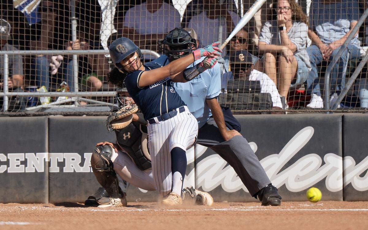 Central Catholic’s Jazmarie Roberts singles to left field to drive in the game’s only run during the Sac-Joaquin Section Division 3 semifinal playoff game with Manteca at Central Catholic high School in Modesto, Wednesday, May 20, 2025. Central Catholic won the game 1–0.