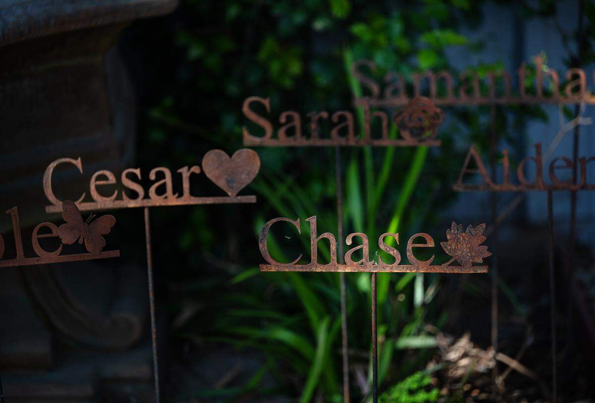 Camp Taylor kids who have passed away are remembered around a fountain in the new water garden at Camp Taylor near Grayson, Calif., on Monday, April 4, 2022.