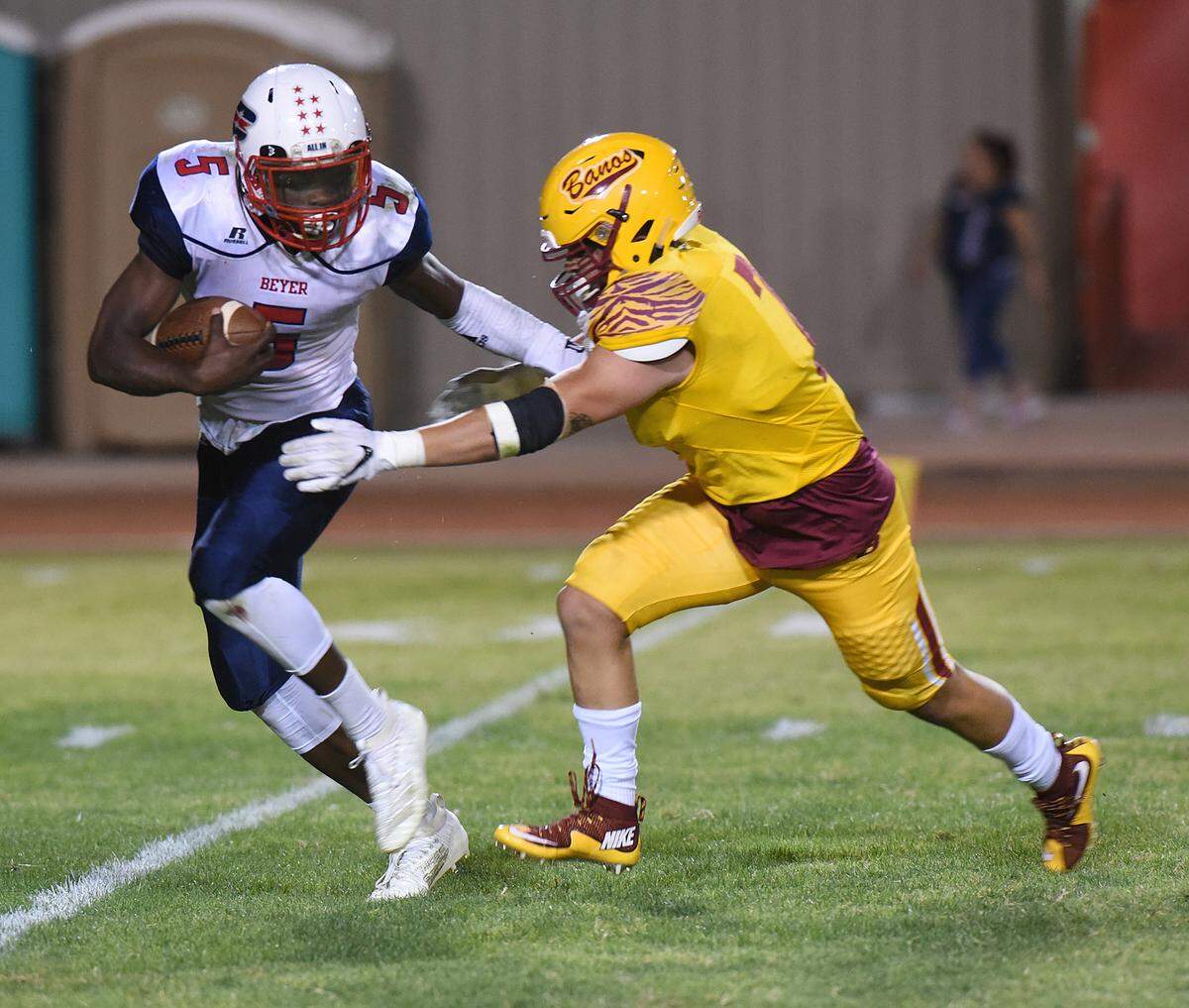 Beyer High running back, Darius Murphy gets away from Los Banos linebacker, Adrian Atangan Friday night, Sept. 20, 2019 at Loftin Stadium in Los Banos. Final score was 14-7 Beyer.