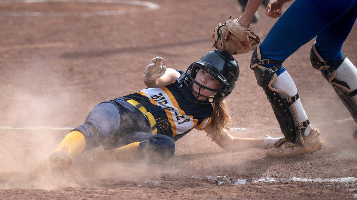 Big Valley’s Olivia Nelson slides home for the Lions’ first run during the CIF NorCal Softball Championship game with Los Altos at Big Valley Christian High School in Modesto, Calif., on Saturday, June 4, 2022.