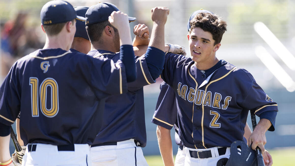 Gregori’s Dylan Boney (2) greets his teammates after scoring during the Central California Athletic League game with Enochs at Enochs High School in Modesto, Calif., Wednesday, May 1, 2019.
