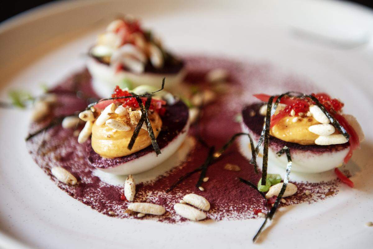 Eggs on Eggs ( house deviled egg filling, pickled ginger, tobiko caviar) at First & Main Restaurant in Turlock, Calif., Wednesday, Aug. 28, 2019.
