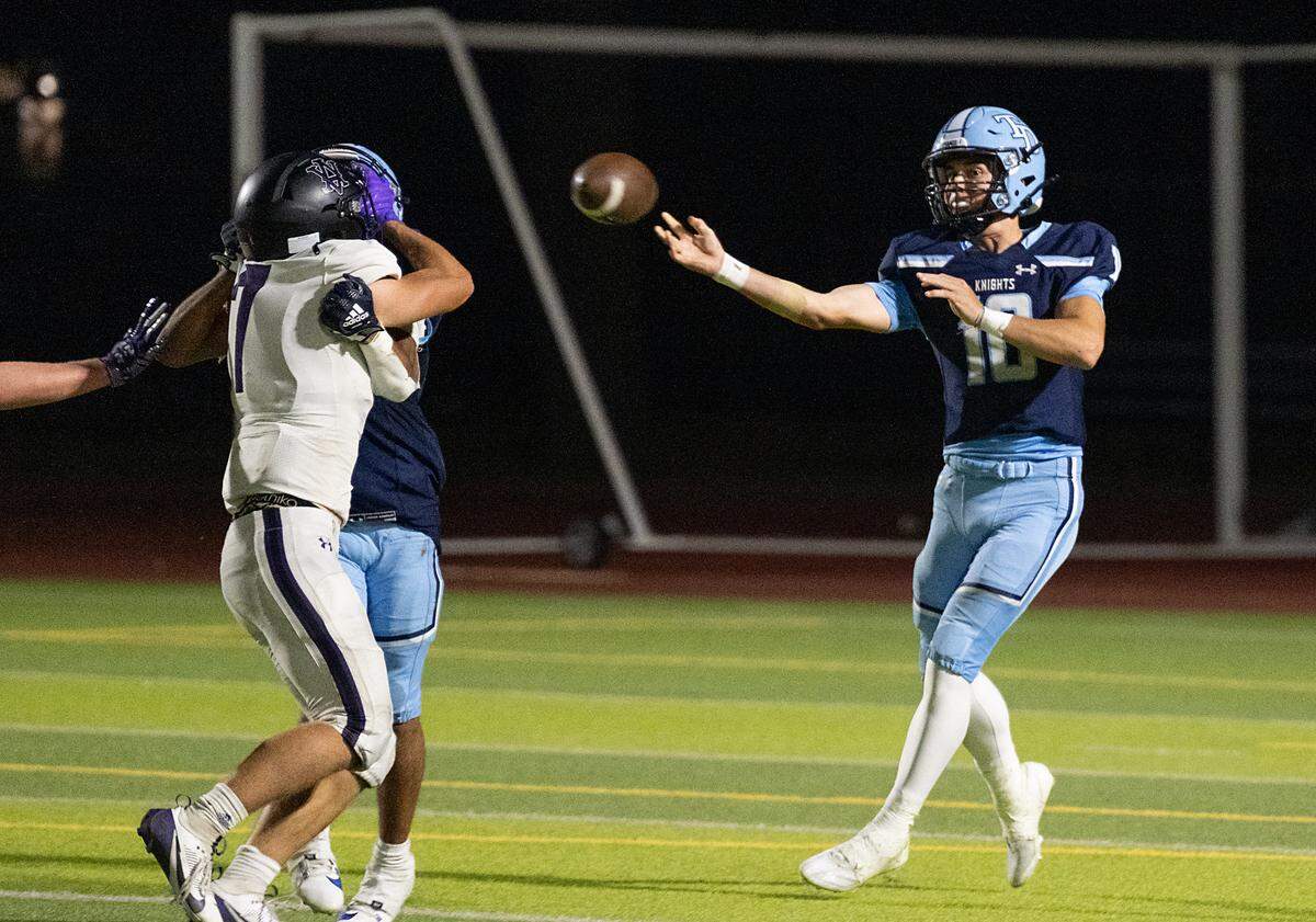 Downey quarterback Carson Lamb makes a pass during the non-league game with Amador Valley at Downey High School in Modesto, Calif., Friday, Sept. 13, 2024.