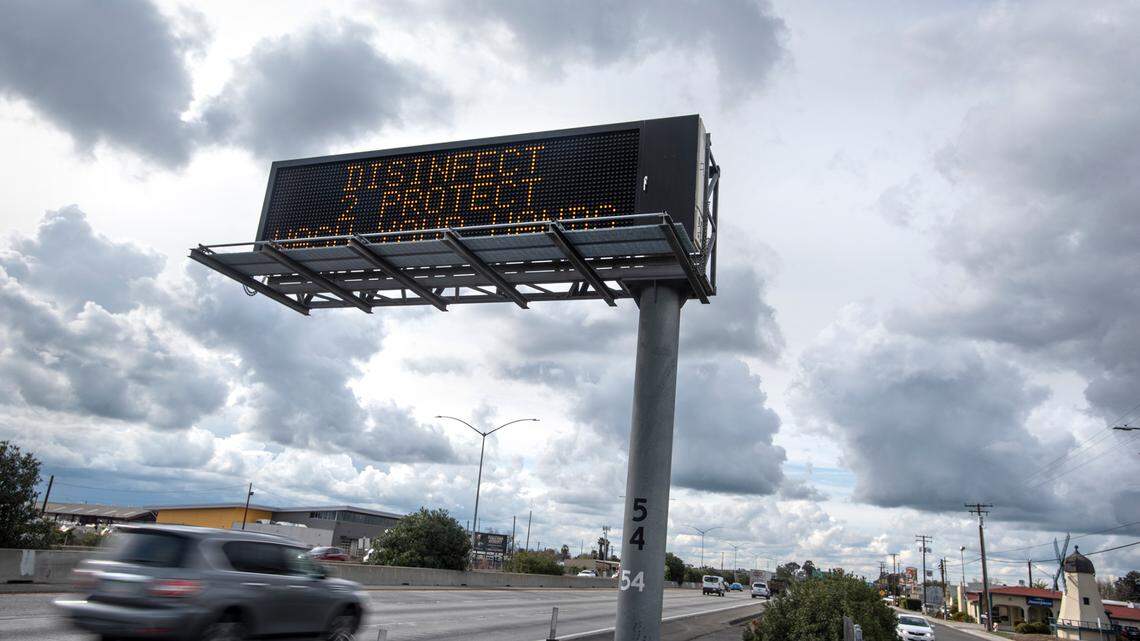 A CalTrans sign on Highway 99 reminds motorists to be vigilant about protecting against the Covid-19 coronavirus in Ceres, Calif., on Tuesday, March 17, 2020.