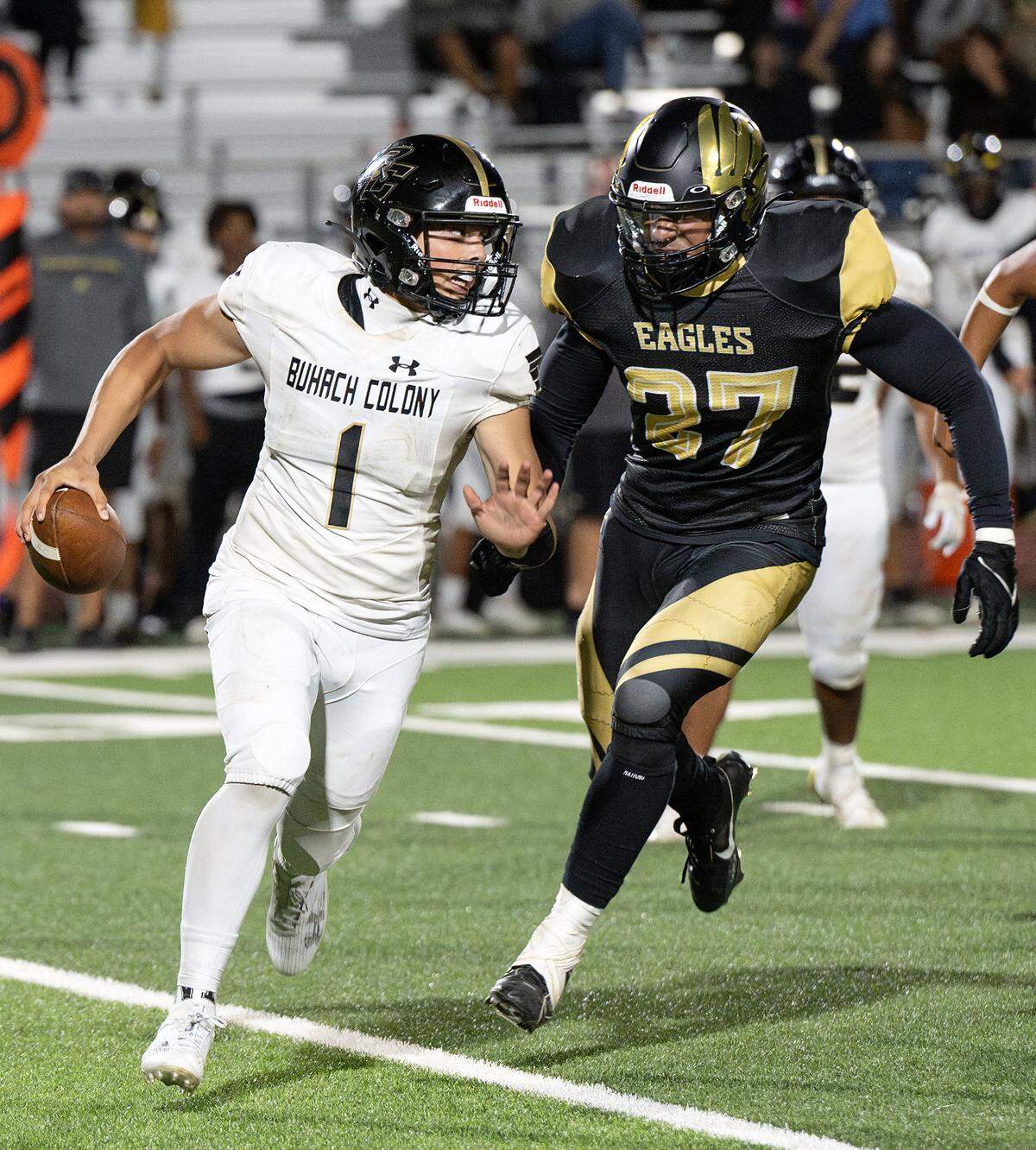 Enochs’ Sebastian Campos (27) tracks down Buhach Colony quarterback Patrick Curran during the non-league game at Gregori High School in Salida, Calif., Friday, Sept. 1, 2023.