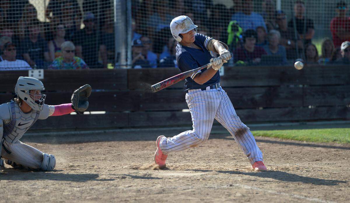 Central Catholic’s Fernando Alaniz makes contact with a pitch against Oakmont High in the CIF Northern California Division III Regional Championship in Roseville, Calif. on Saturday, June 1, 2024.