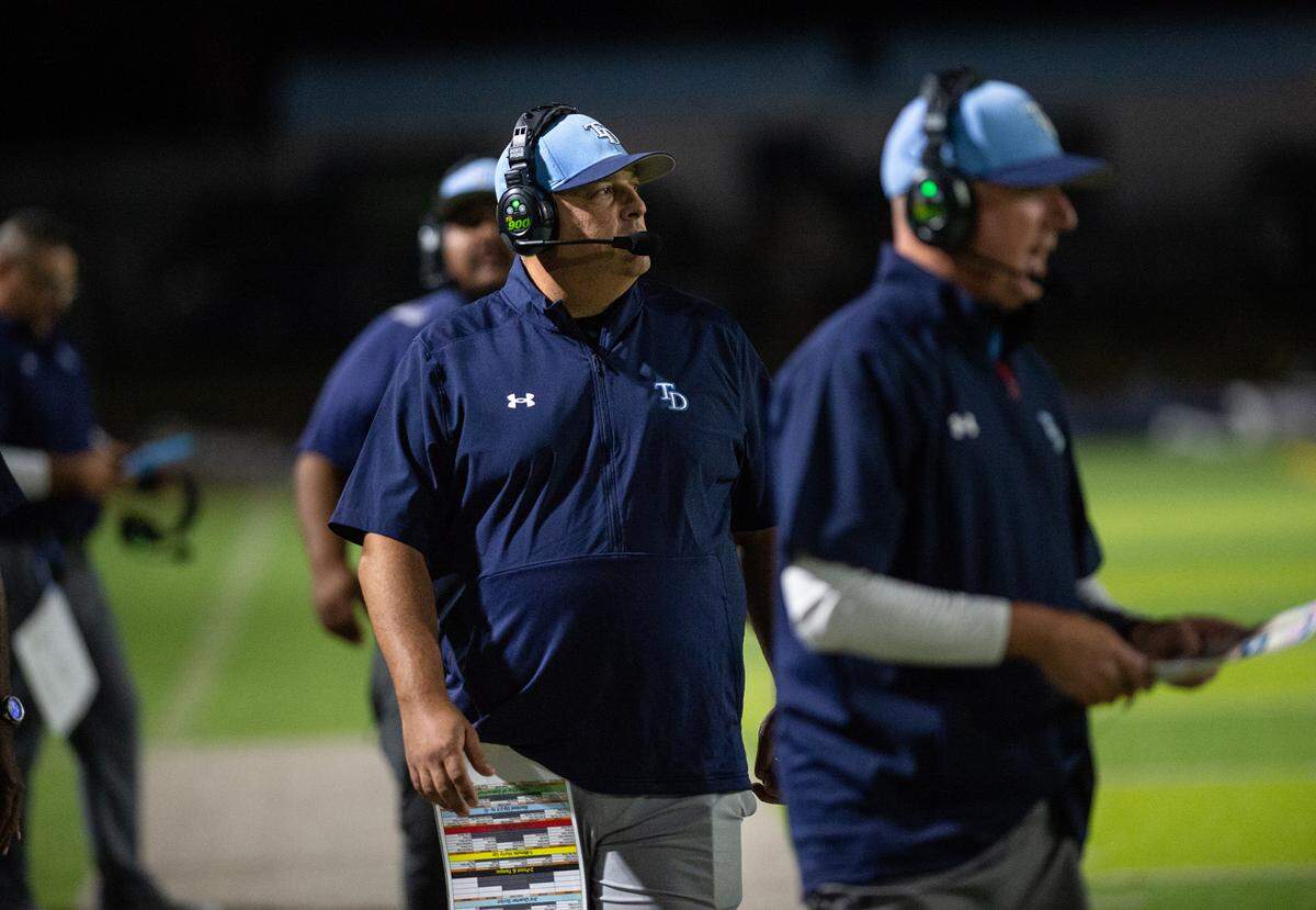 Downey head coach Jeremy Plaa watches the action during the nonleague game with Tracy at Downey High School in Modesto, Calif., on Friday, September 16, 2022.