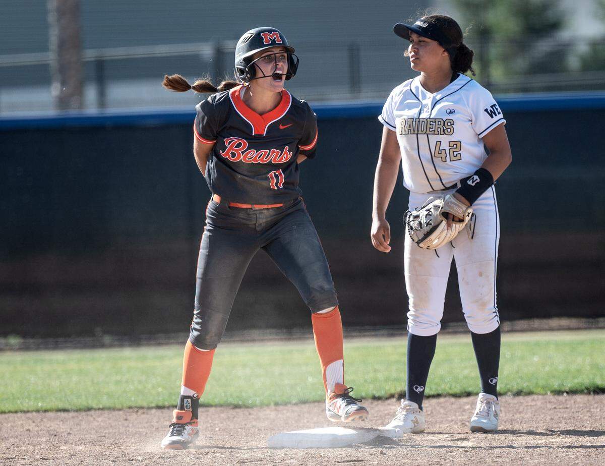 Merced’s Ava Brown yells out to the bench after hitting a double in the seventh inning during the CIF Sac-Joaquin Section Division III softball playoff game with Central Catholic at Central Catholic High School in Modesto, Calif., on Thursday, May 19, 2022.