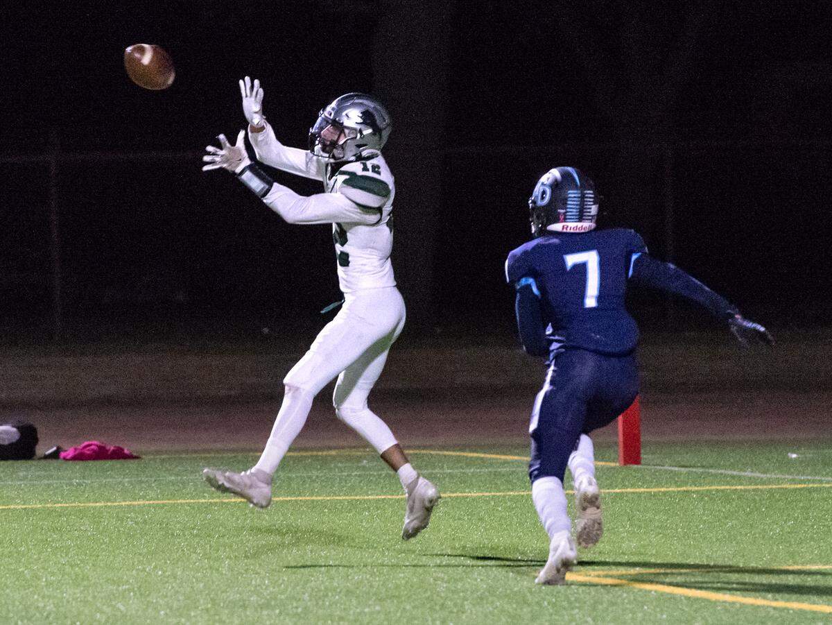 Pitman’s Cruzito Garcia makes a catch in the end zone during the Central California Athletic League game with Downey at Downey High School in Modesto, Calif., Friday, Oct. 28, 2022.