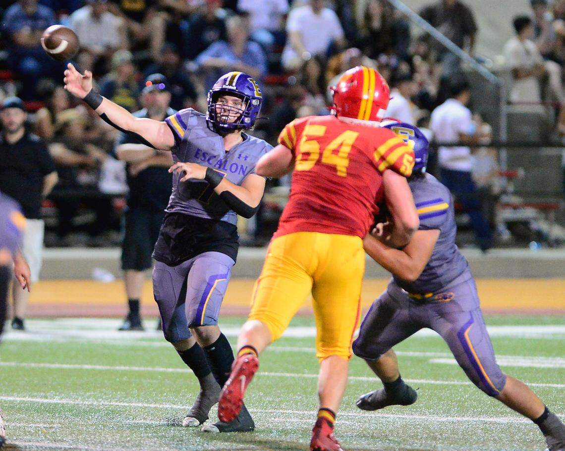 Escalon quarterback Donovan Rozevink (7) throws a pass during a game between Oakdale and Escalon at Oakdale High School in Oakdale, California, on September 15, 2023.