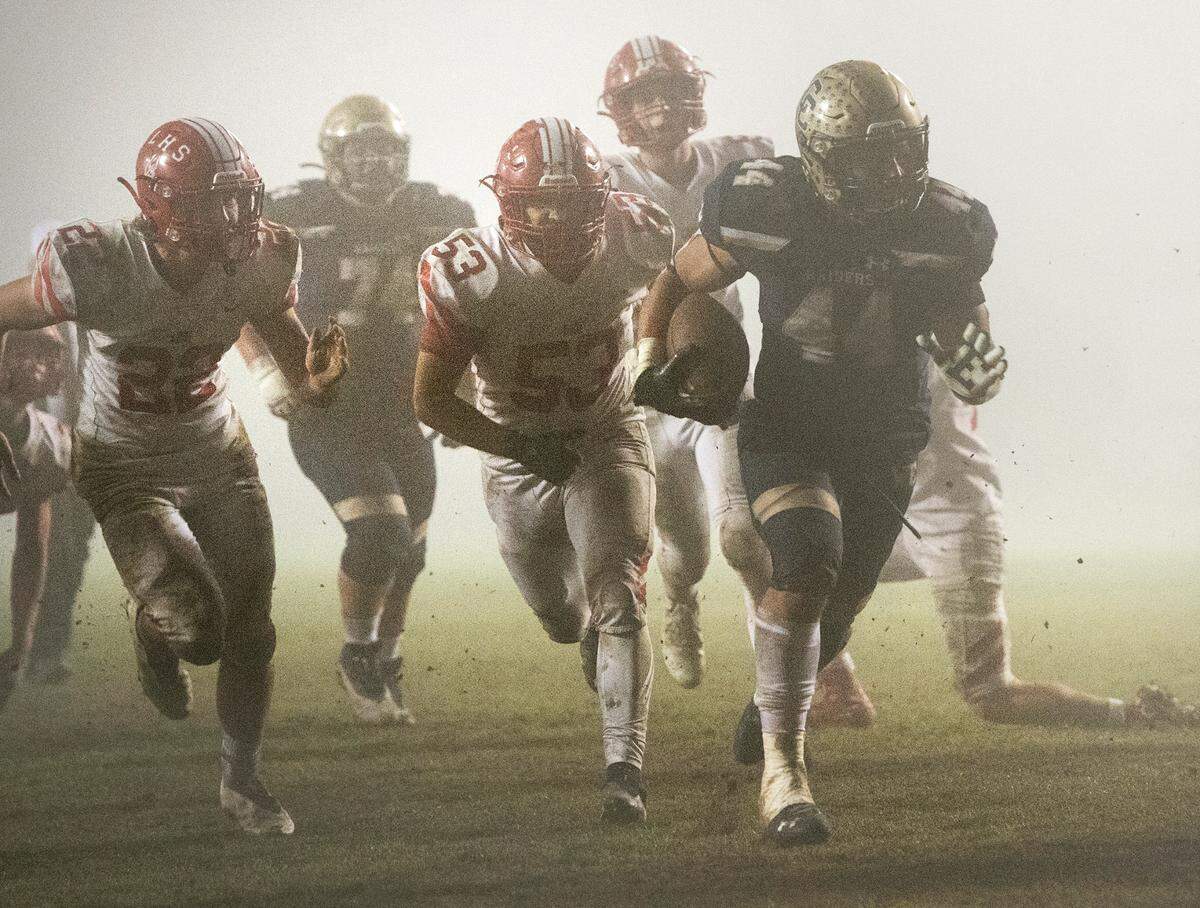 Central Catholic’s Aiden Taylor runs for a touchdown in the fourth quarter during the second round Sac-Joaquin Section football playoff game with Lodi in Modesto ,Calif., on Friday, Nov. 12, 2021. Central Catholic won the game 38-34.