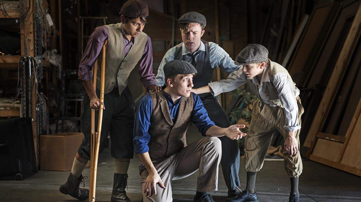 From the left, Pablo Hernandez, Jeffry Jackson and John Sylvester, and Jacob Holdaway, kneeling, are part of the cast of the Modesto Performing Arts production of Newsies. Photographed in Modesto, Calif., Wednesday, July 24, 2019.