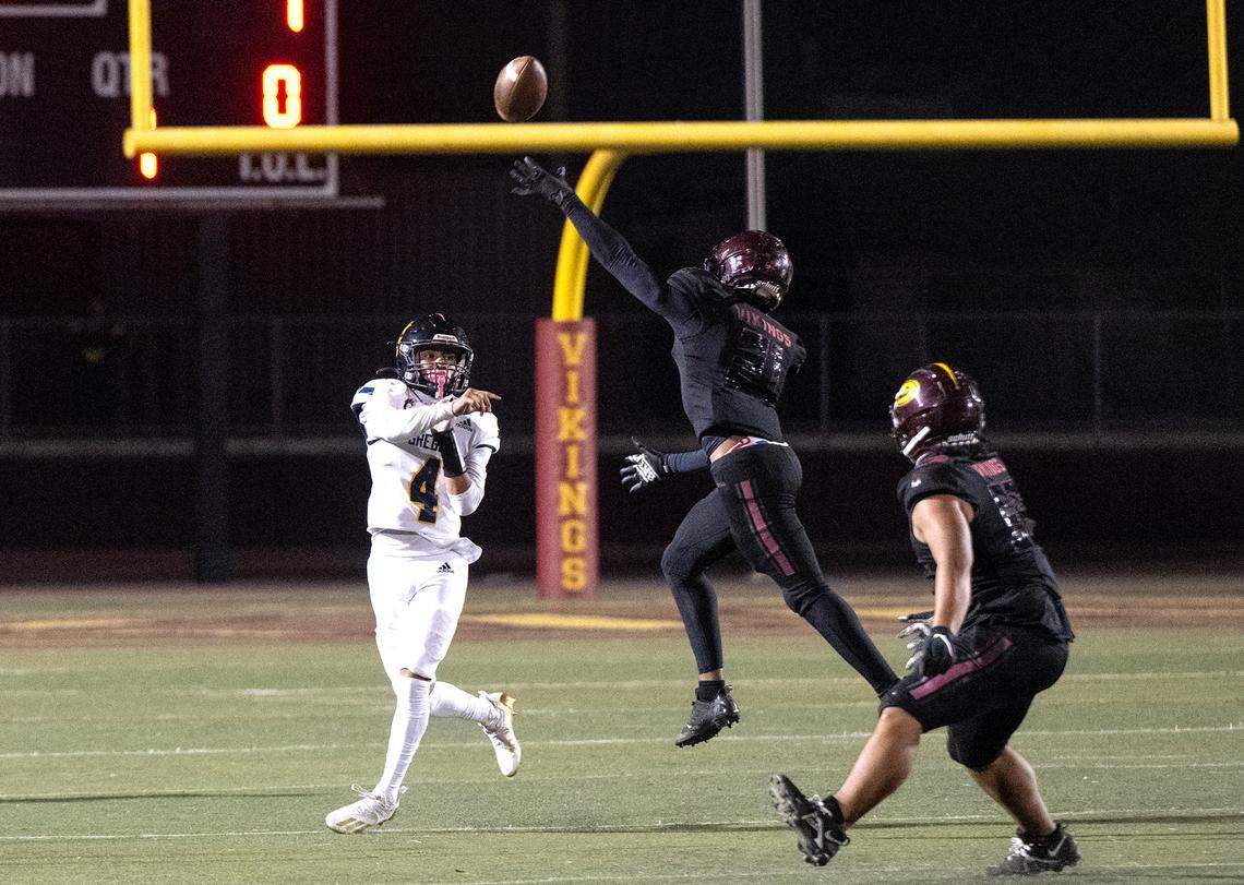 Gregori quarterback Emmanuel Vasquez throws the ball over Edison’s Arshawn Fox during the Sac-Joaquin Section Football Division I playoff game at Edison High School in Stockton, Calif., Friday, Nov. 3, 2023.