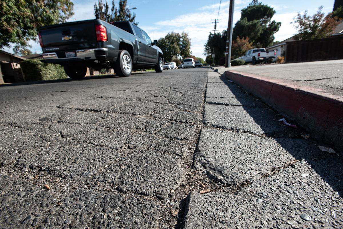 Distressed pavement on Orangeburg Avenue in Modesto, Calif., Tuesday, Nov. 1, 2022. in Modesto, Calif., Tuesday, Nov. 1, 2022. Work is scheduled to begin on Orangeburg Avenue from Coffee Road to Oakdale Road as part of a pavement rehabilitation project.