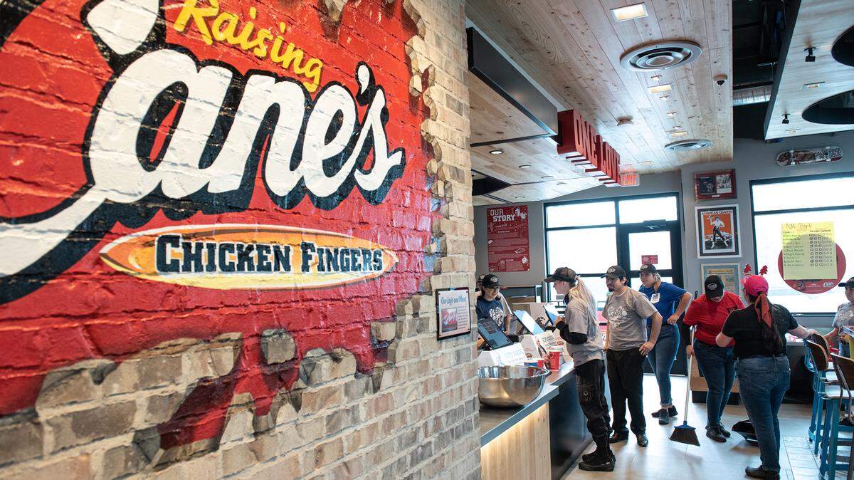 New employees participate in training in preparation for Monday’s grand opening at Raising Cane’s Chicken Fingers restaurant in Modesto, Calif., Friday, Dec. 16, 2022.