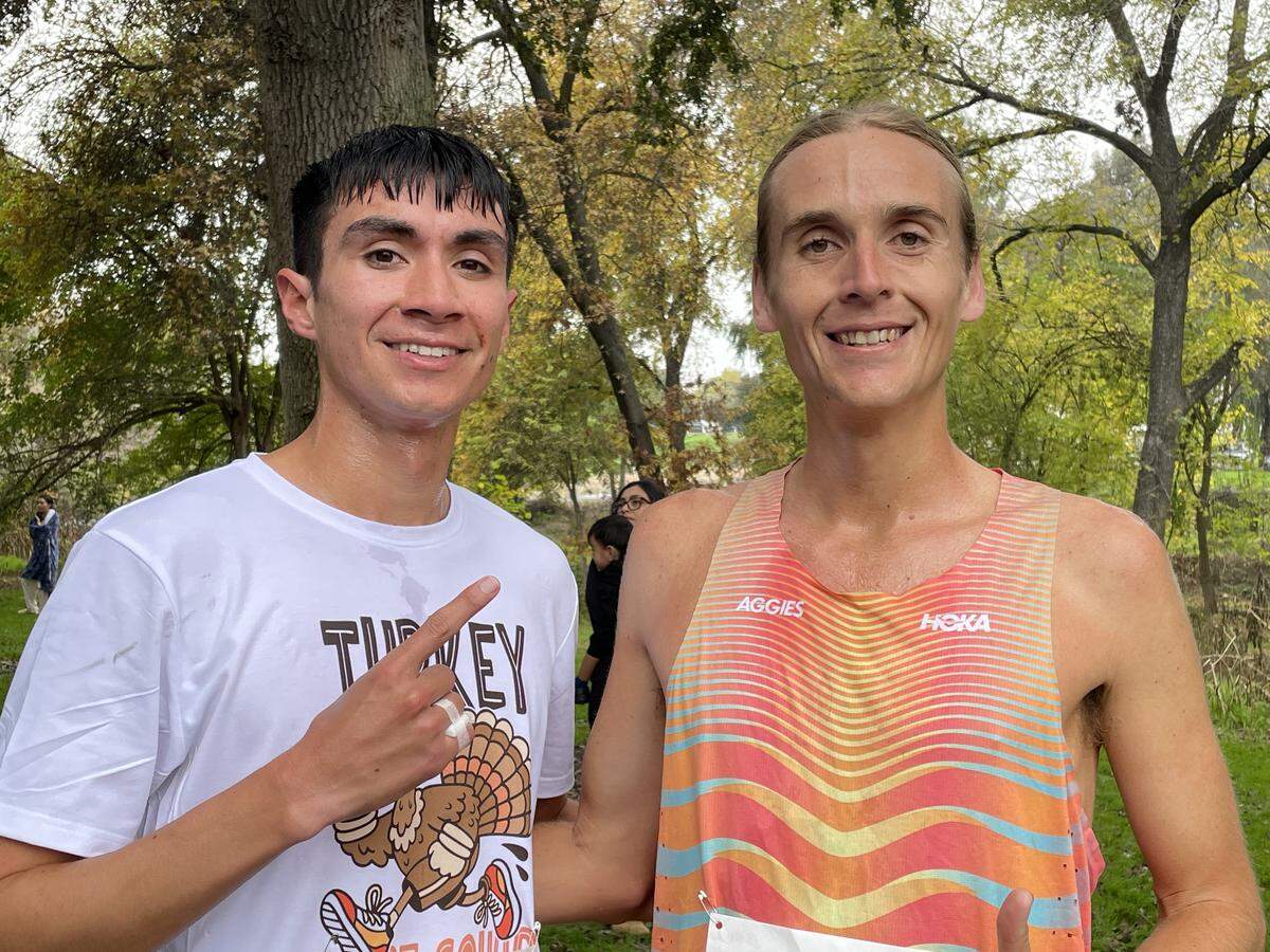 Andrew Vazquez, left, and Michael Mrgudic are running buddies who tied for first at the Turkey Trot on Nov. 27, 2025. The 3.1-mile race took place in Tuolumne River Regional Park.