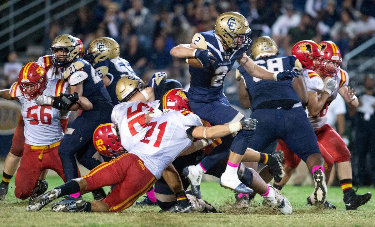 Central Catholic’s Tyler Jacklich rushed for 215 yards in the Valley Oak League game with Oakdale in Modesto, Calif., Friday, Oct. 14, 2022. Central Catholic won the game 35-7.