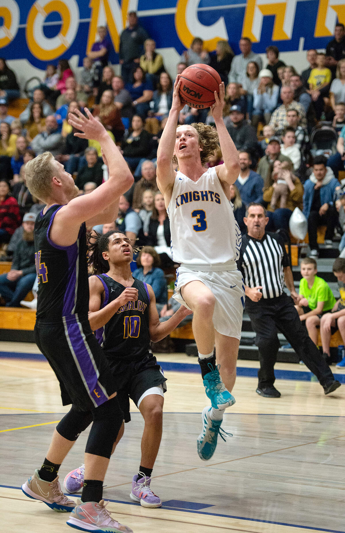 Ripon Christian’s Eli Terpsma attempts a jump shot during the Trans Valley League game with Escalon at Ripon Christian High School in Ripon, Calif., on Friday, Jan. 7, 2022. Ripon Christian won the game 61-53.