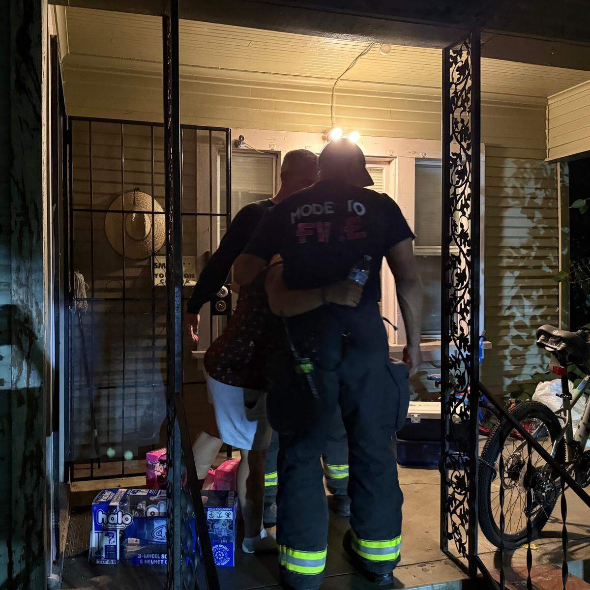 Modesto Firefighters deliver a new scooter and helmet to the family after the motorcycle accident on Thursday, July 17, 2025.