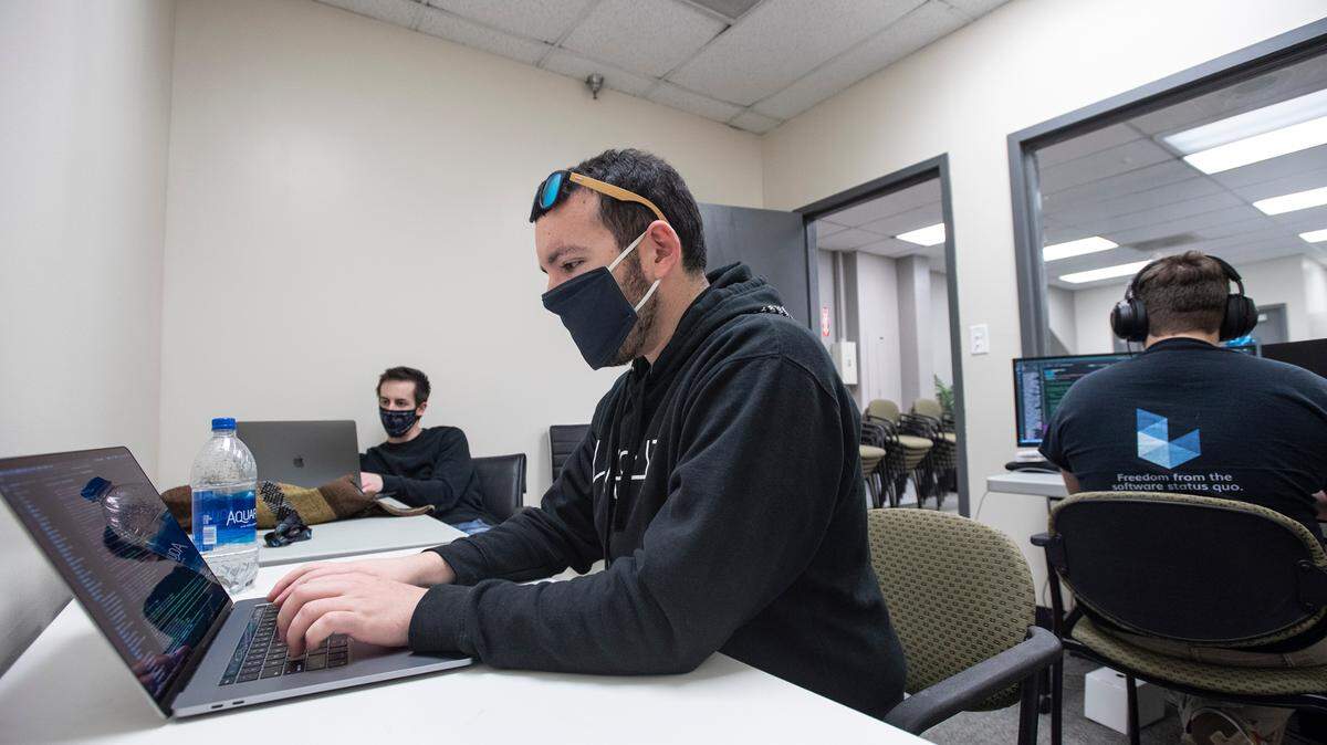 Instructor and software developer Taylor LaMar works on code at Bay Valley Tech in Modesto, Calif., on Wednesday, March 3, 2021.