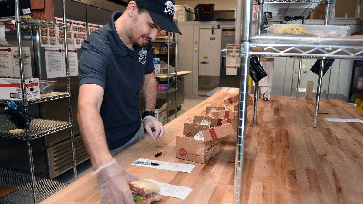 Tyler Landmeier makes boxed lunches Thursday September 19, 2019 at Apple Spice in Modesto, Calif. shortly after its opening.
