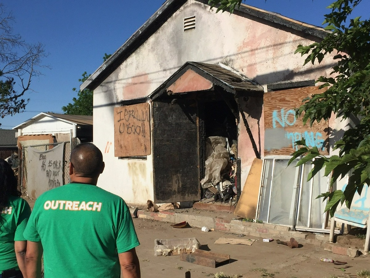 Stanislaus County personnel took action to remove squatters from a derelict residential parcel Monday in southwest Modesto. About 15 people who were living illegally on the nuisance property began the process of registering for services.