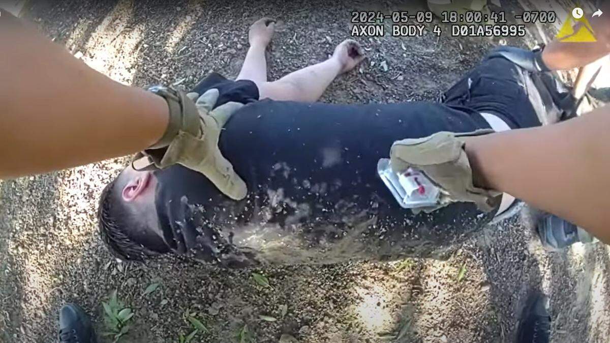This image is from a video that shows a Stanislaus County deputy sheriff preparing to administer a second dose of Narcan to a man, in an attempt to reverse the deadly effects of fentanyl.