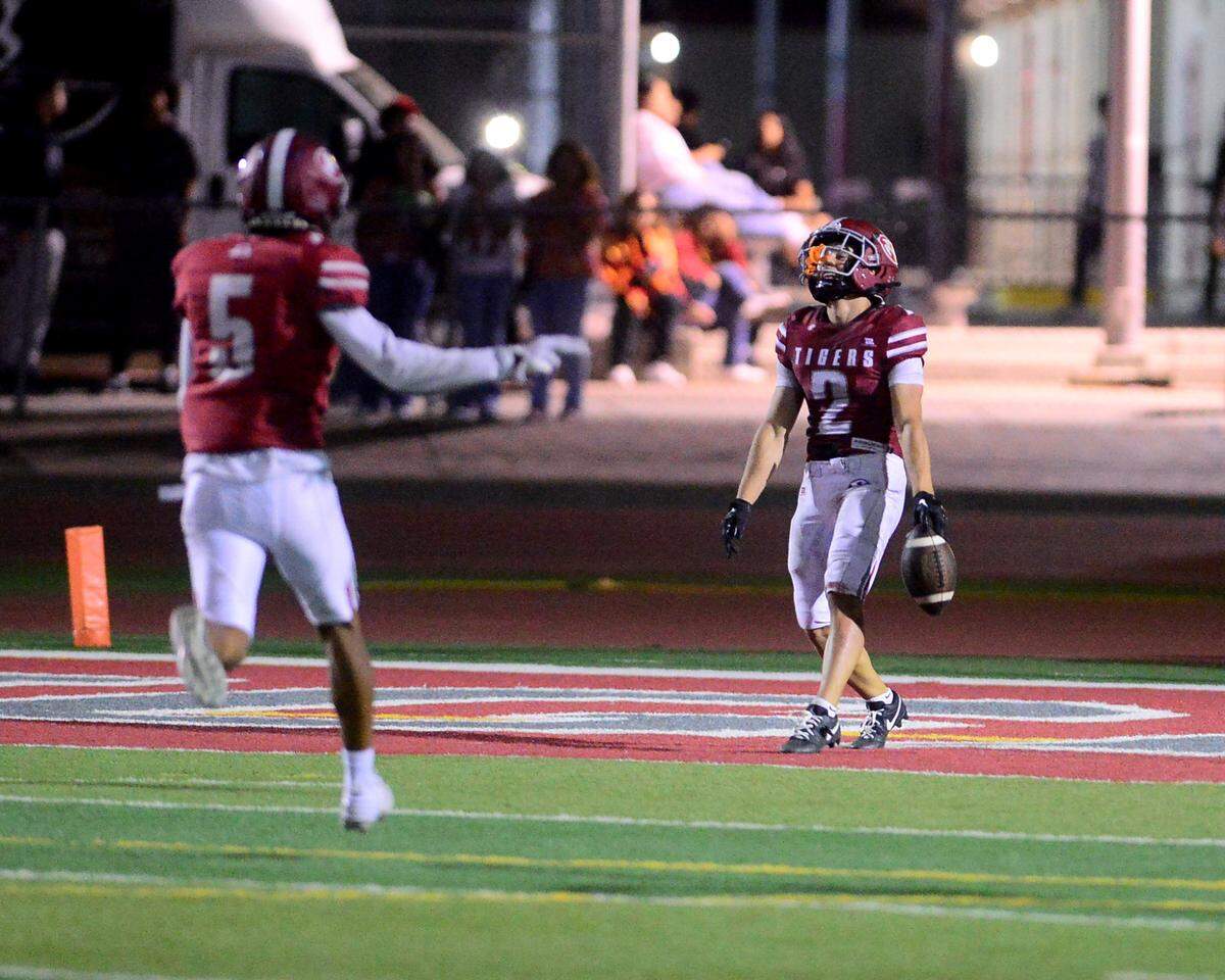 Patterson receiver Noah Cozart (2) celebrates after scoring a touchdown during a game between Patterson High School and Merced High School at Patterson High on Aug. 23, 2024.