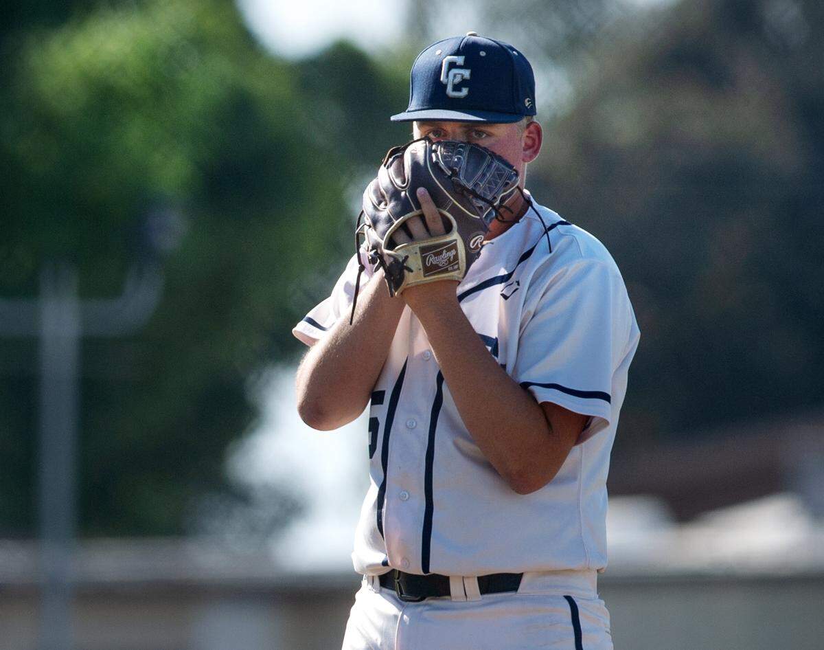 Central Catholic pitcher Nolan Anderson looks at the sign from catcher Fernando Alaniz during the CIF Sac-Joaquin Section Division III semifinal game with Vanden at Central Catholic High School in Modesto, Calif., on Wednesday, May 18, 2022. Central won the game 6-1 to force game three.