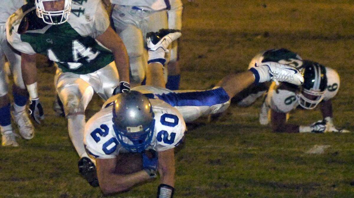 Central Valley’s Timmy Henley (44) and Stephen Fonsworth (6) can’t stop Jarrod Daniels as he makes a touchdown in Oct. of 2008.