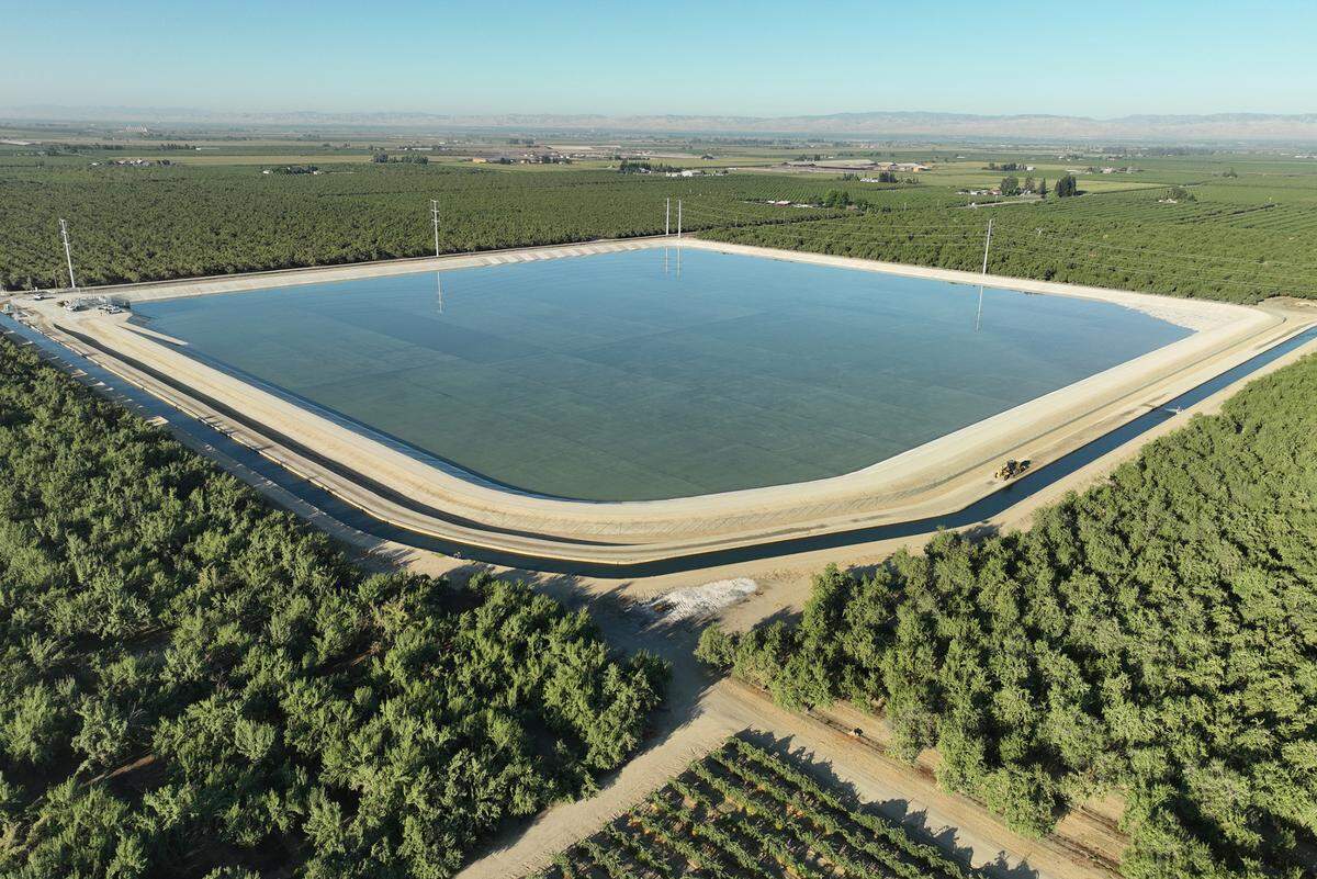 The Turlock Irrigation District completed a small reservoir that helps manage canal flows near Keyes, California, in August 2023.