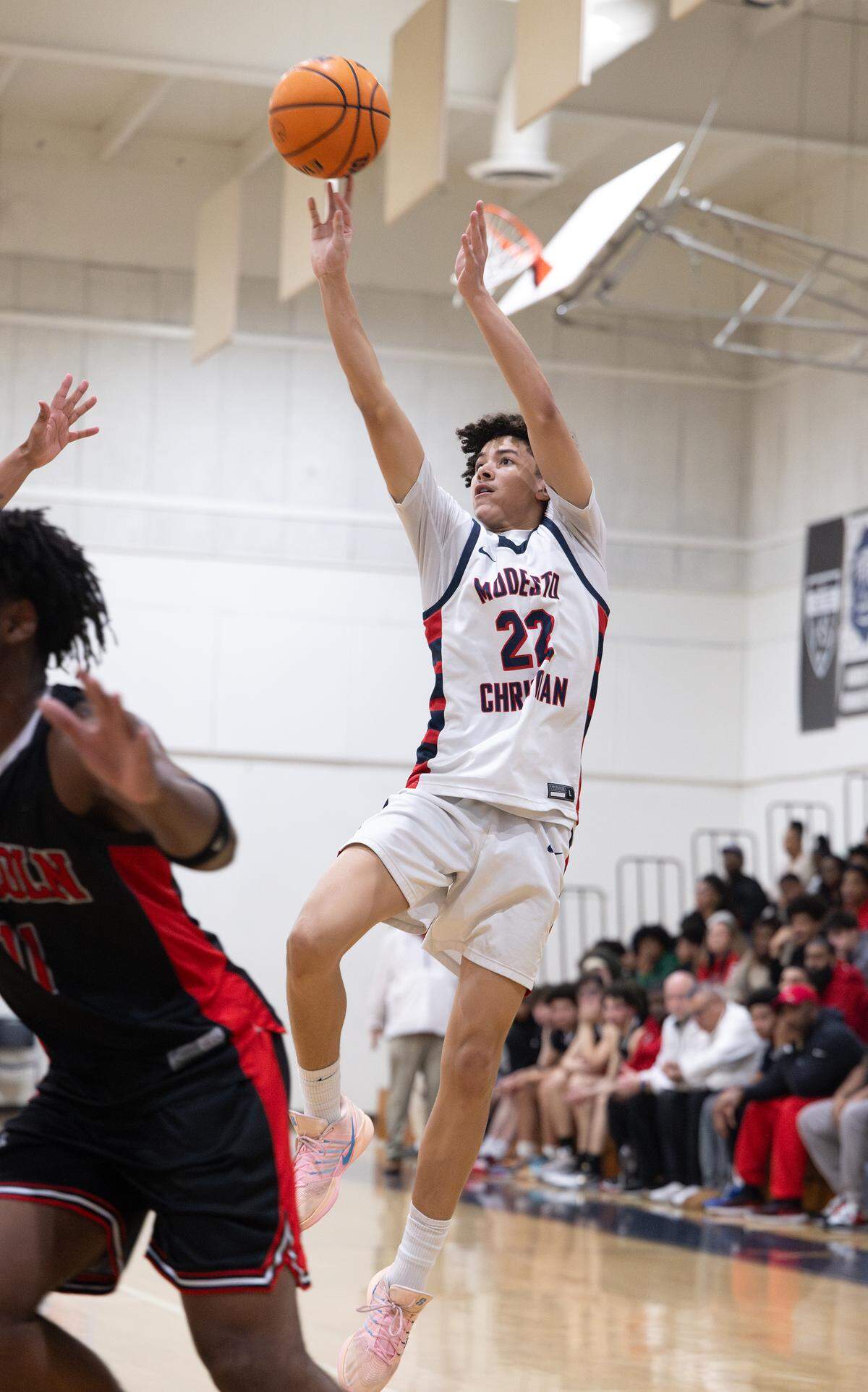 Modesto Christian’s Trevor Dickson sinks a three-point shot in the Tri-City Athletic League game with Lincoln at Modesto Christian High School in Salida on Wednesday Feb. 4, 2026.