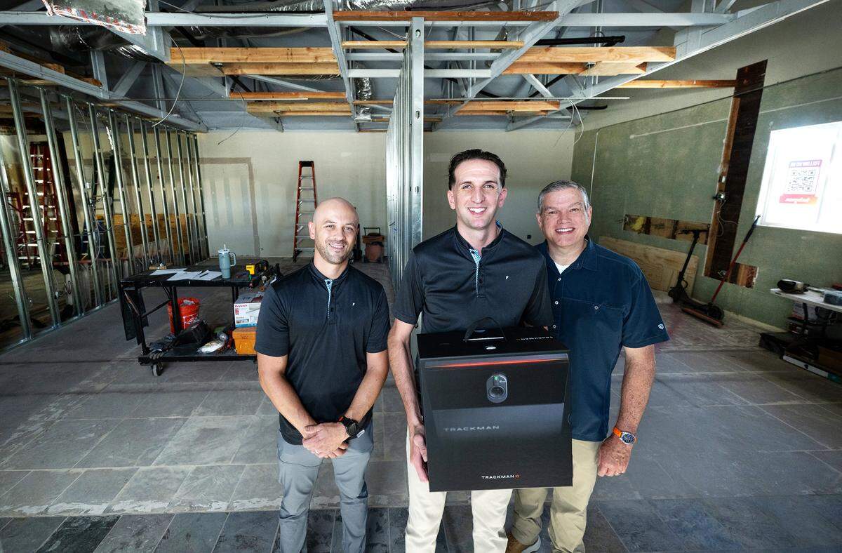 Ownership team, left to right, Kirk Williamson, Luke Brown and Ken Brown at The Fairway Club in Ripon, Calif., Friday, Aug. 16, 2024. The indoor membership-only club will be using the Trackman golf simulation system.
