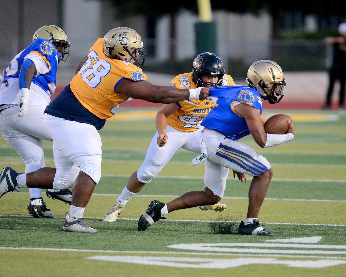 Central Catholic’s Troy Leota (68) sacks St. Mary’s quarterback Samson Hunkin (9) during the 2024 Lions All-Star High School Football game at Tracy High School in Tracy, Calif. on June 22, 2024.