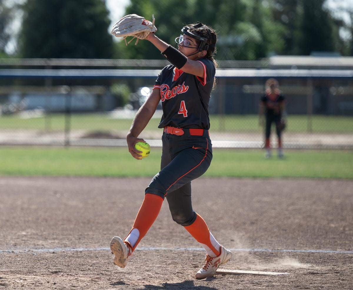 Merced’s Melody Gomez delivers a pitch during the CIF Sac-Joaquin Section Division III softball playoff game with Central Catholic at Central Catholic High School in Modesto, Calif., on Thursday, May 19, 2022.