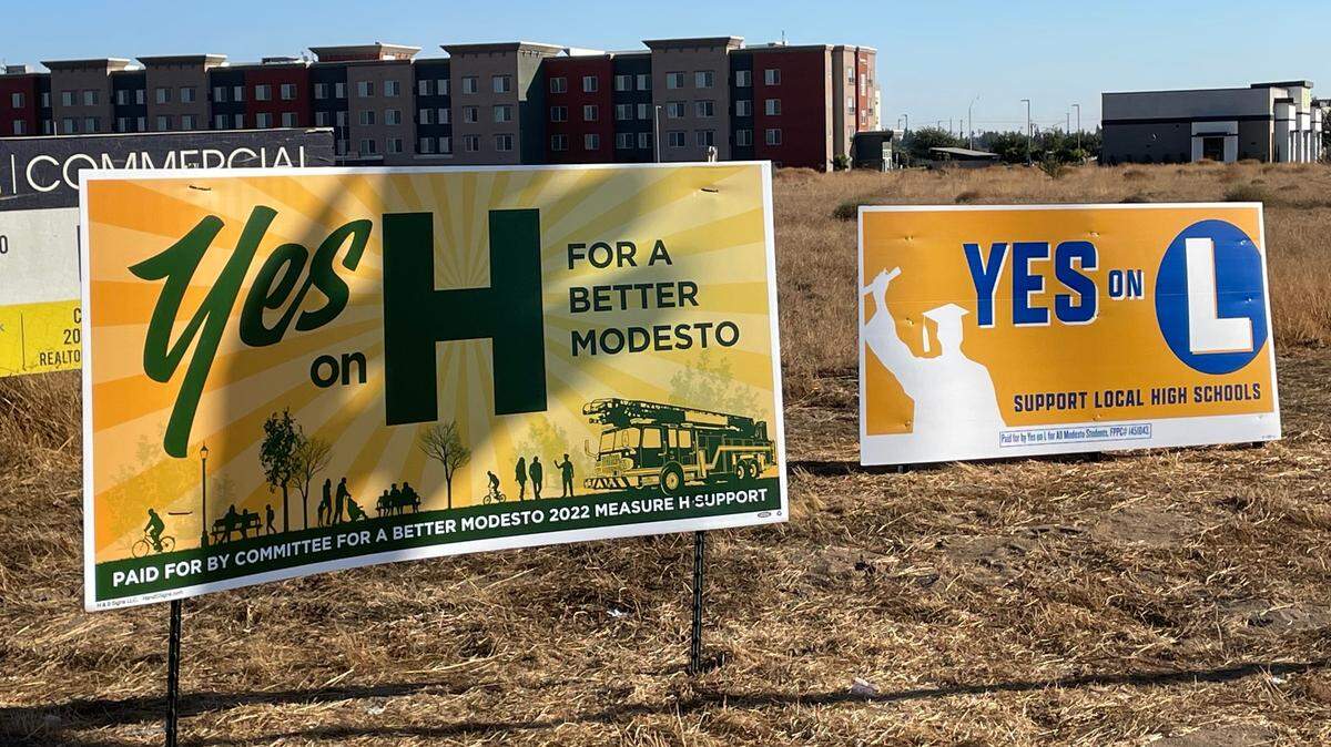 Campaign signs promote Measures H and L at Kiernan Avenue and Dale Road in north Modesto, CA on Oct. 11, 2022.