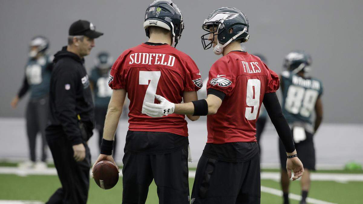Philadelphia Eagles quarterback Nick Foles meets with Nate Sudfeld (7) during practice at the team's NFL football training facility in Philadelphia, Thursday, Jan. 18, 2018. (AP Photo/Matt Rourke)Philadelphia Eagles quarterback Nick Foles meets with Nate Sudfeld (7) during practice at the team's NFL football training facility in Philadelphia, Thursday, Jan. 18, 2018.